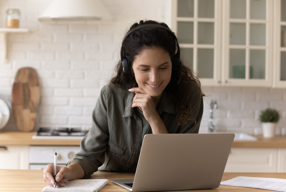 woman watching video on computer learning